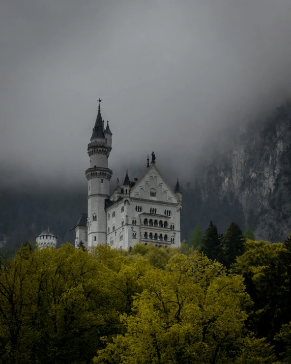 the large building has a steep tower on it