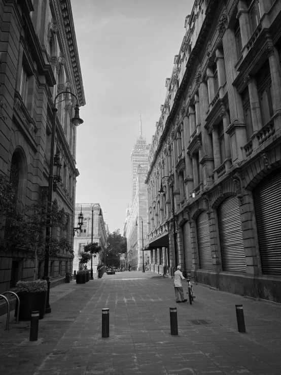 black and white po of an alley with people