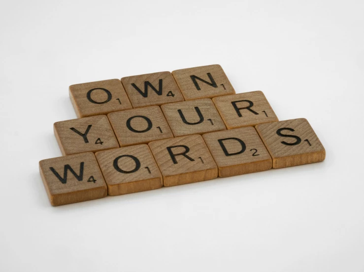 some type of words spelling on wood blocks