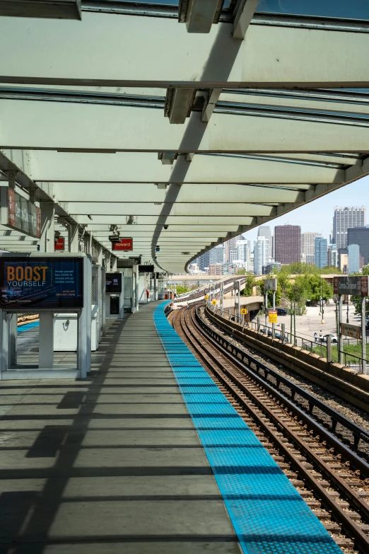 there are several railroad tracks in this train station