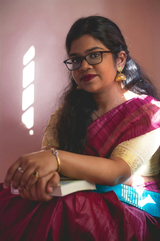 a woman in a colorful dress with long hair