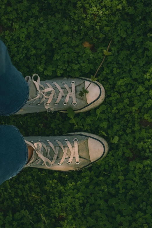 the person with their foot resting on a string