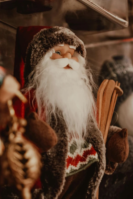 a small figurine sitting in a shelf with a beard