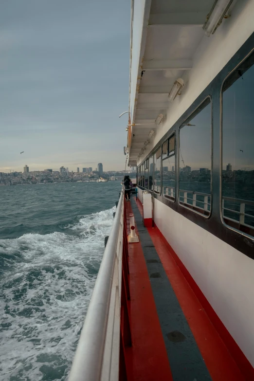 the view of a river running past a boat