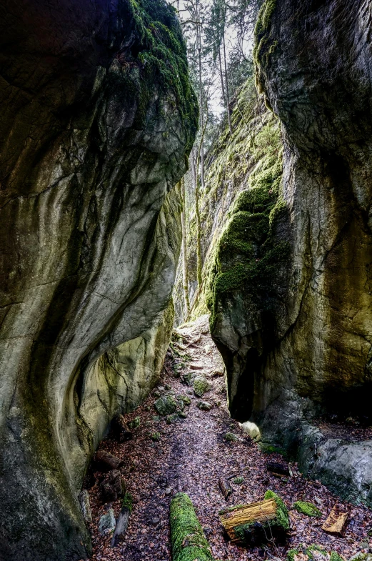 a narrow path between two large rocks