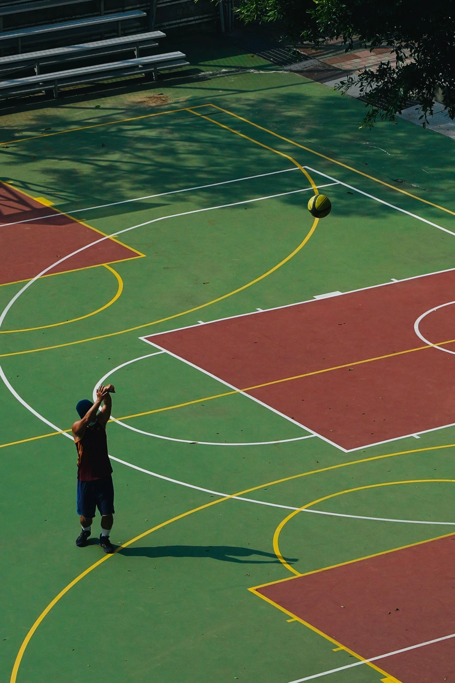 a person on a court throwing a ball