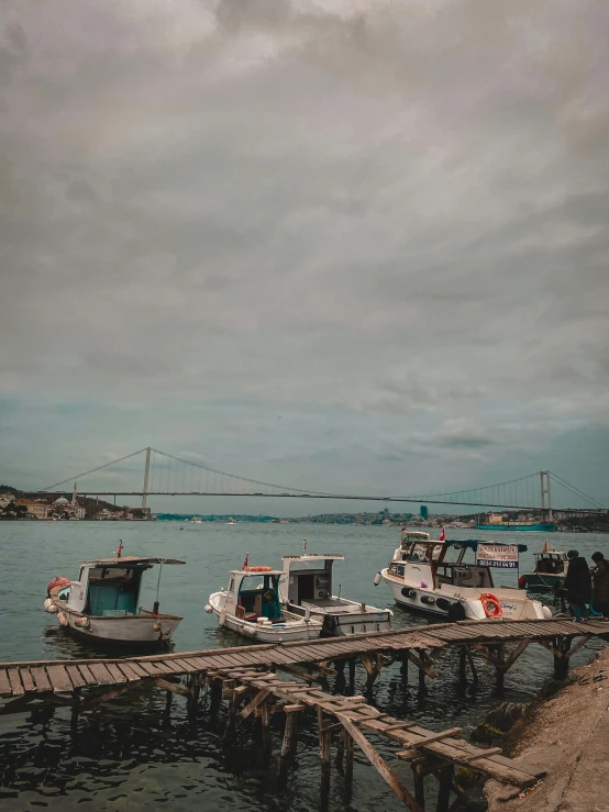 a couple of boats that are sitting in the water