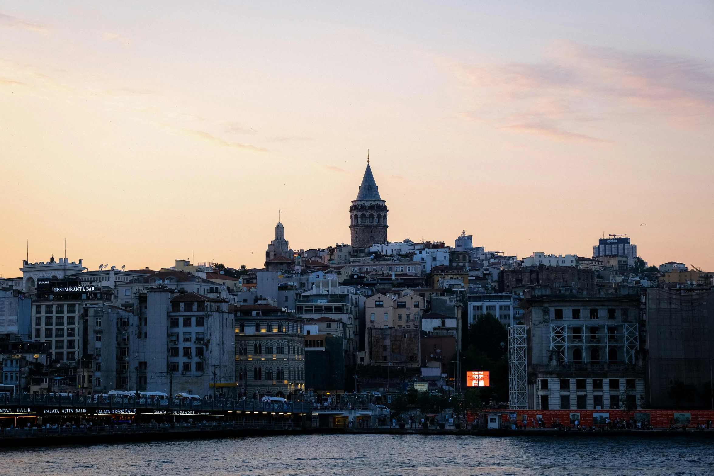 a cityscape with the building spire on top of it