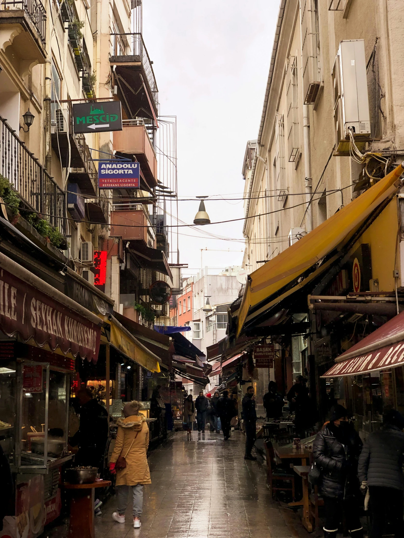 an outdoor market in the city near many buildings