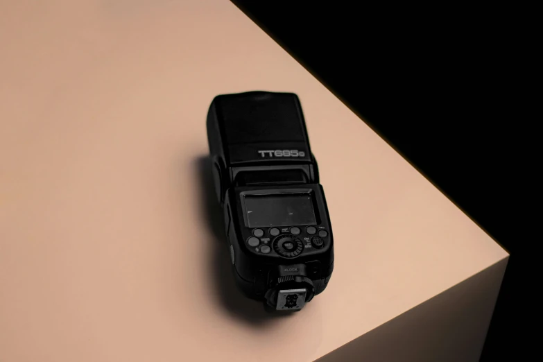 a cellphone sitting on top of a beige table