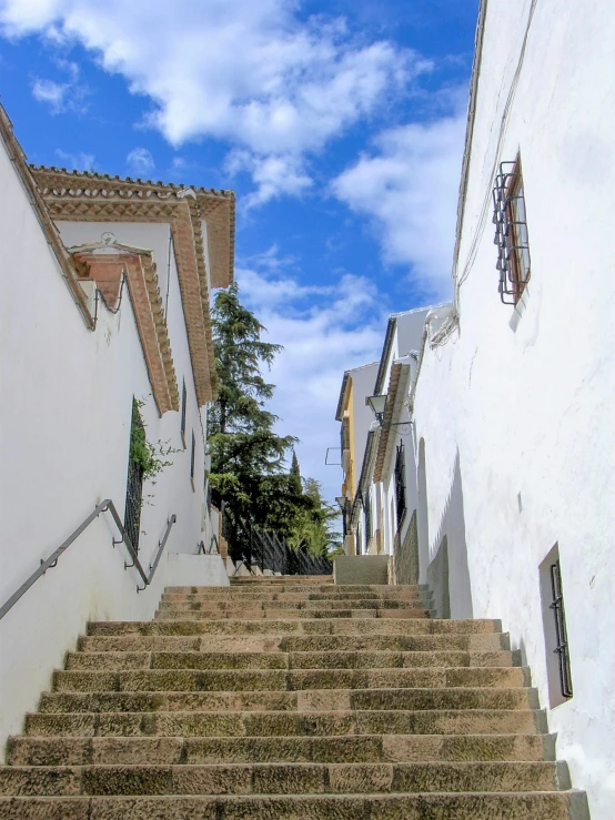 a number of stairs in an alley with no people