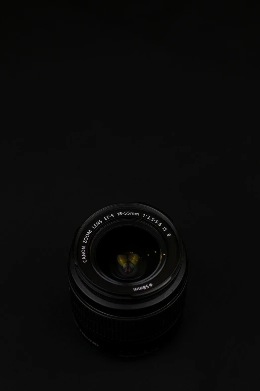 a camera lens is shown on a black background