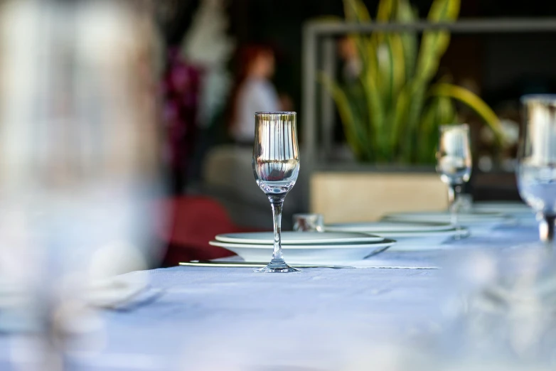 three empty wine glasses sitting on top of a table