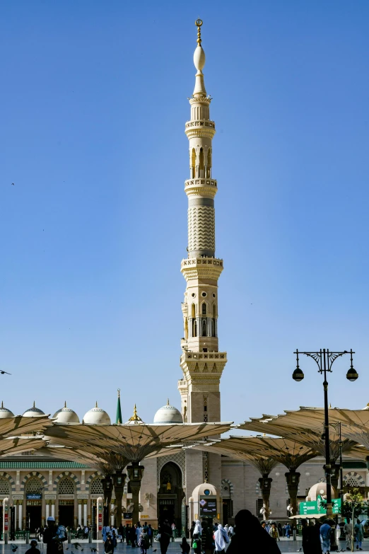 a very tall building with a tower next to it