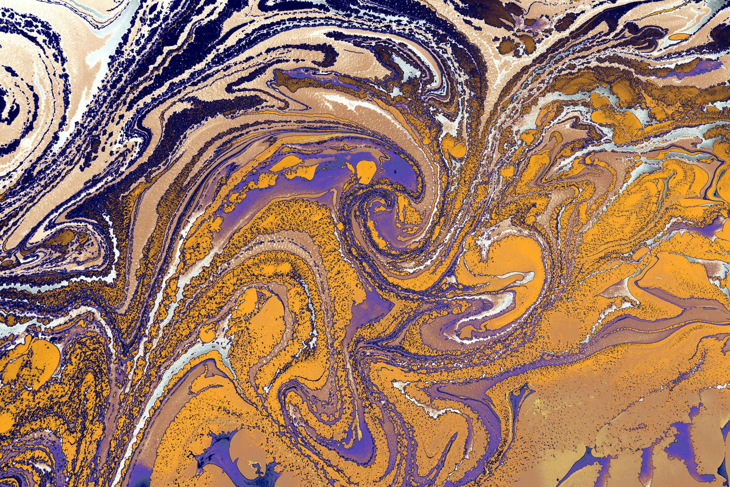 an artistic pograph of a swirl of ink and paint