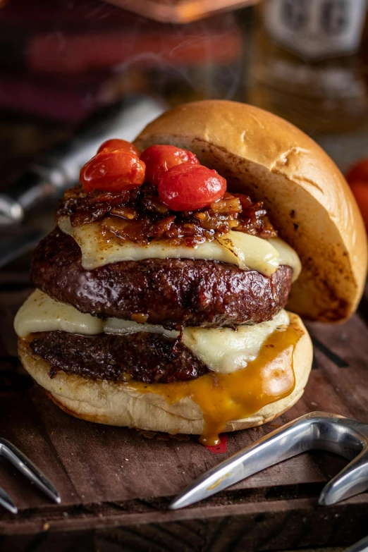 a burger sitting on top of a wooden  board