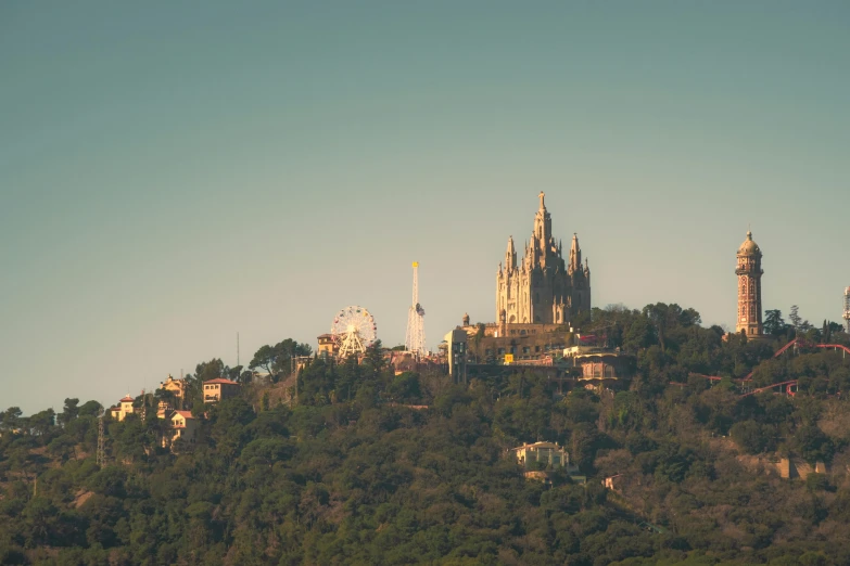 a very tall castle sitting on top of a hill