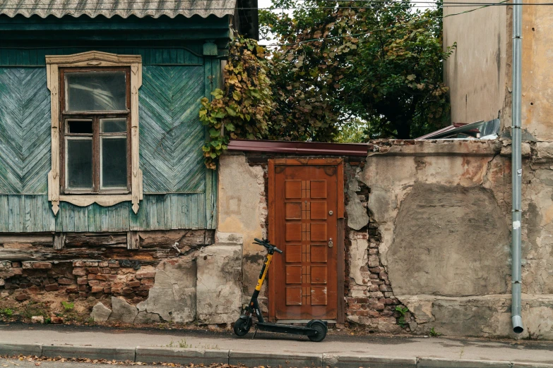 an old building that has a bike parked in front