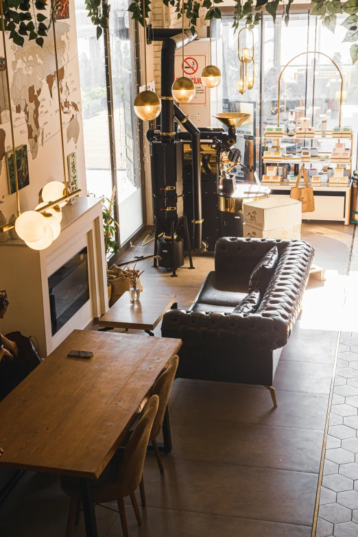 this is a coffee shop with some brown furniture