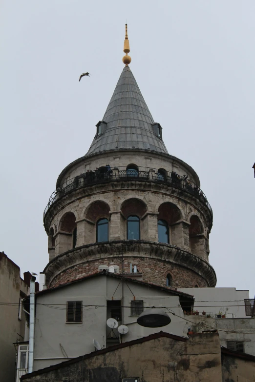 a large building with a tower with a clock