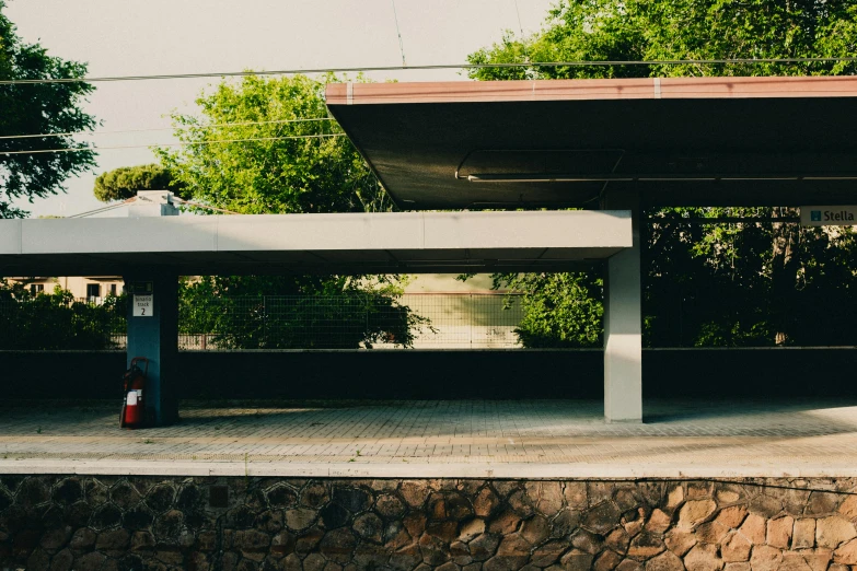 there is an empty table near a small building