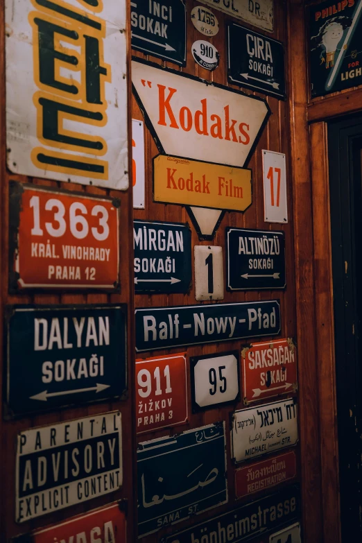 a number of different signs on a wall