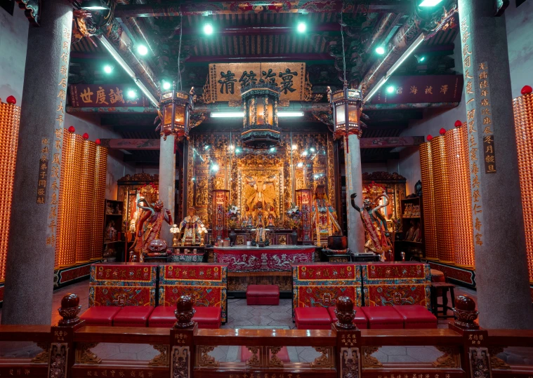 a large shrine inside of a building in asia