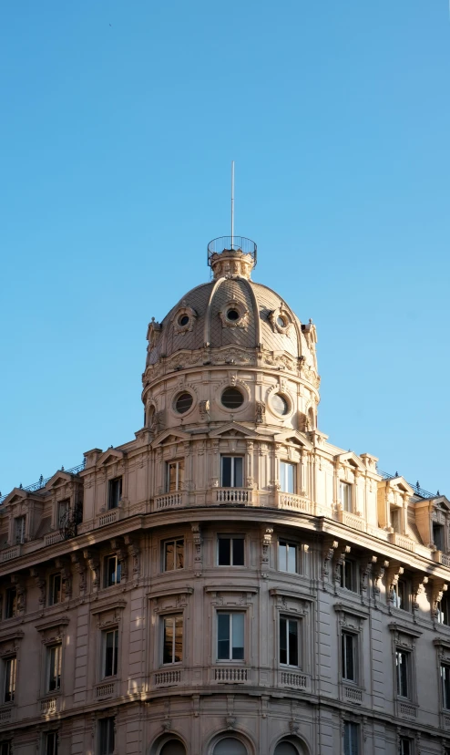 an old european building is shown against a blue sky