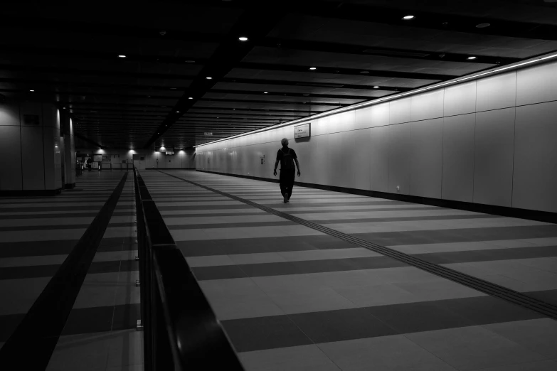 a person standing on top of a tiled floor