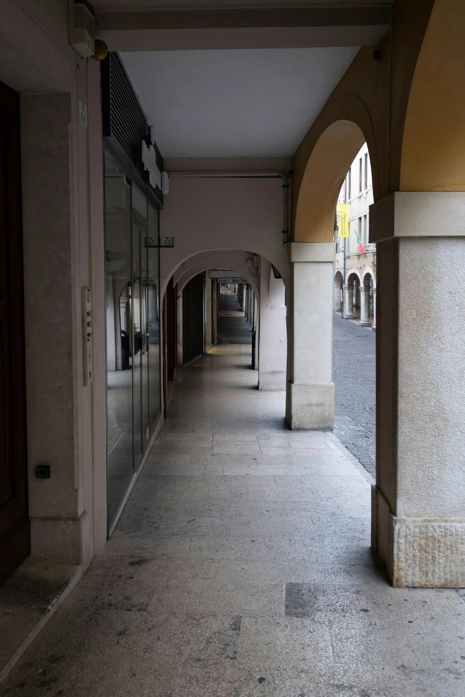 the arched building has several windows at each end