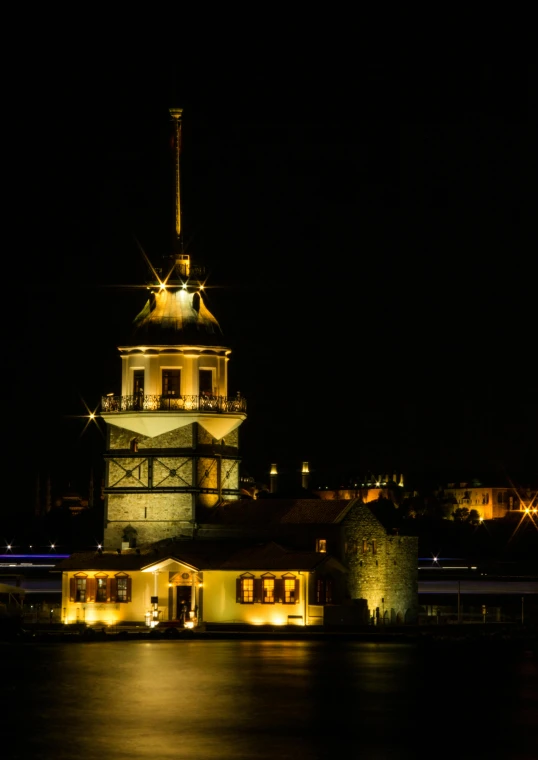 there is a building at night time and it is all lit up