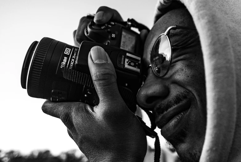 a man that has his picture taken with a camera