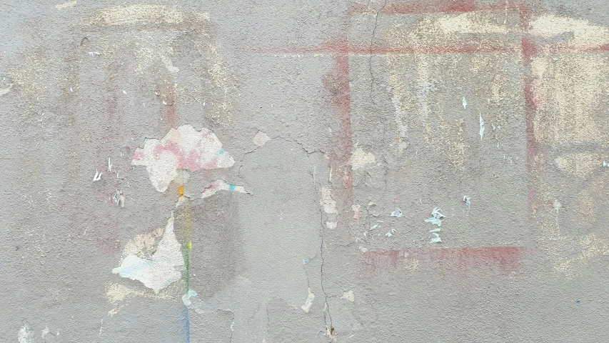 a close up view of a graffiti wall with flowers