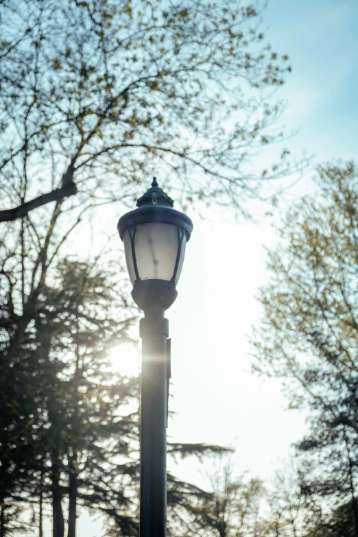 a street lamp lite up by the sun