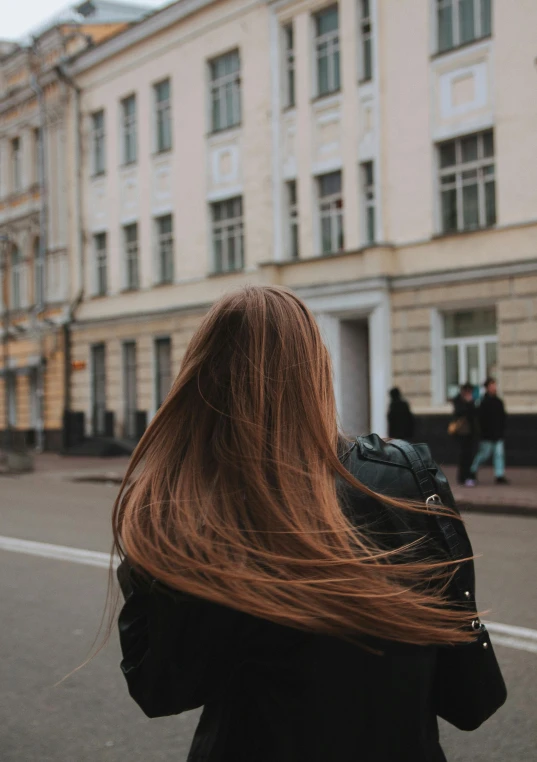 a close up of a person with long hair