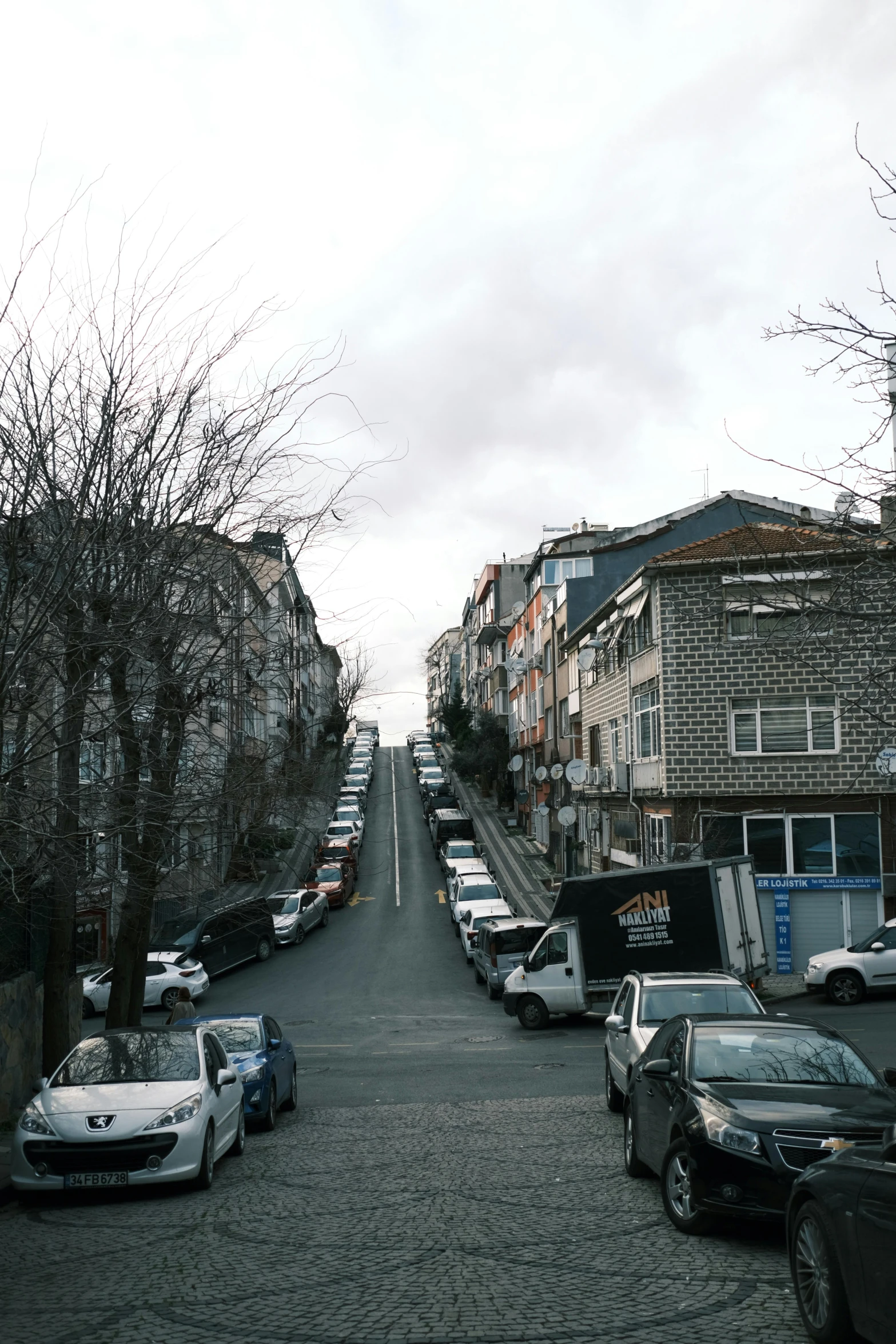 a group of cars parked on the side of a road