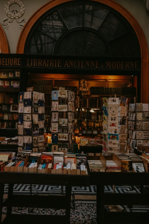 a room filled with books and bookshelves