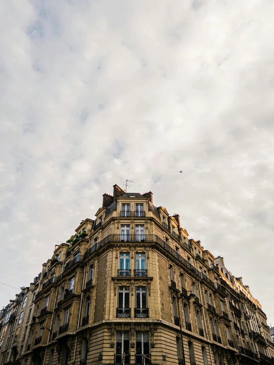 a very large building with many windows and a clock