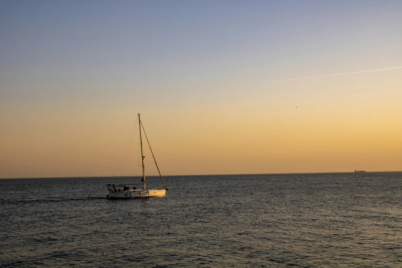 an image of a sailboat out on the water