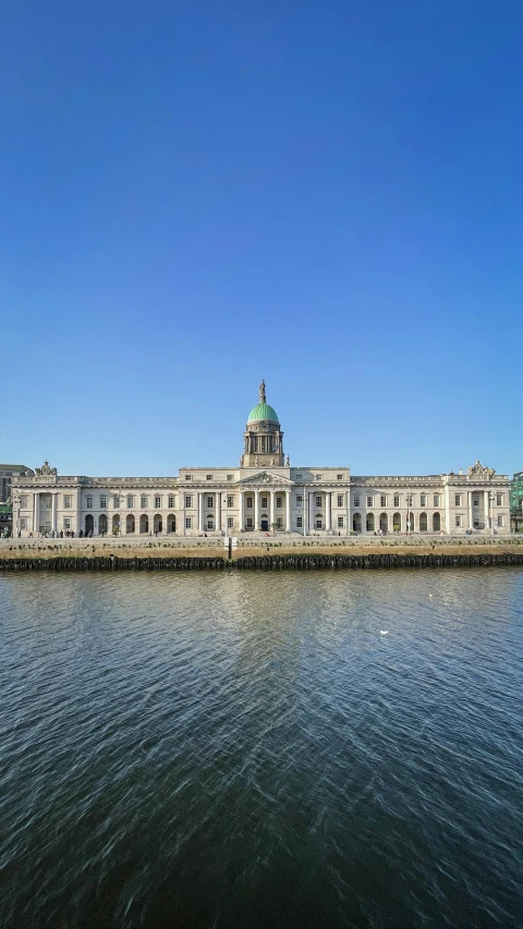 a big building sitting on top of the water