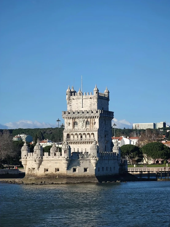 an image of a castle on a lake