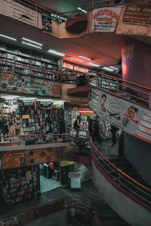 the inside of an underground liry with some book shelves