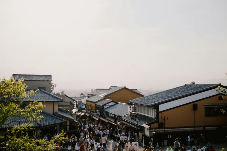 people standing on the rooftops of a building