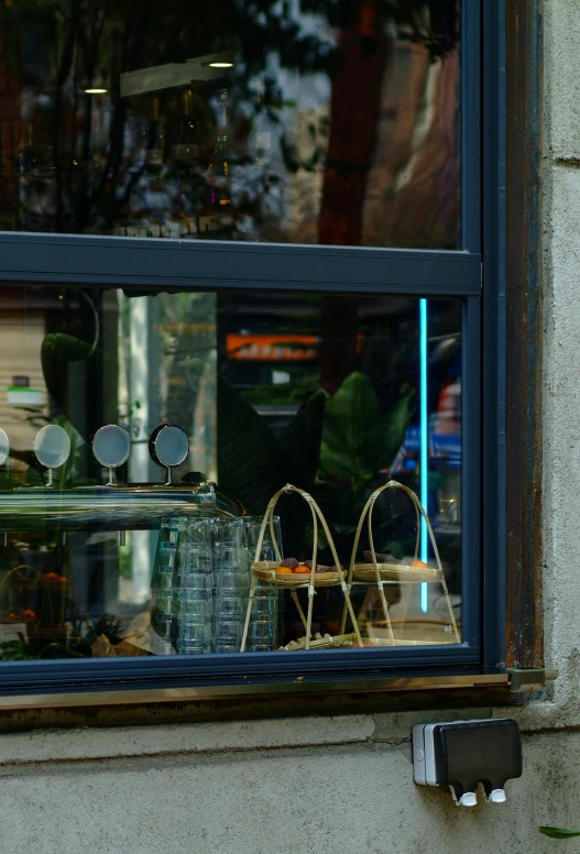 there are baskets on the window sill outside