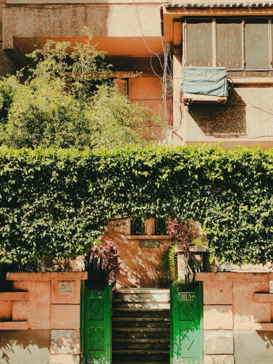 a picture of the street from the air and green doors