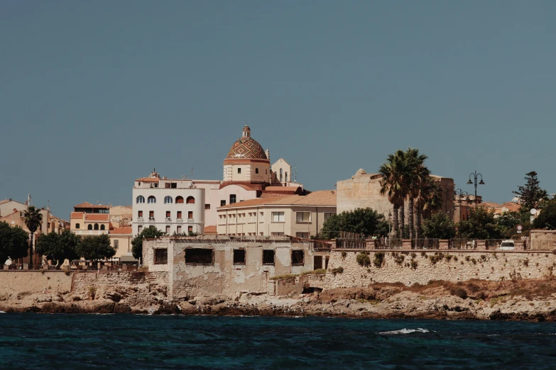 the old building is next to the sea