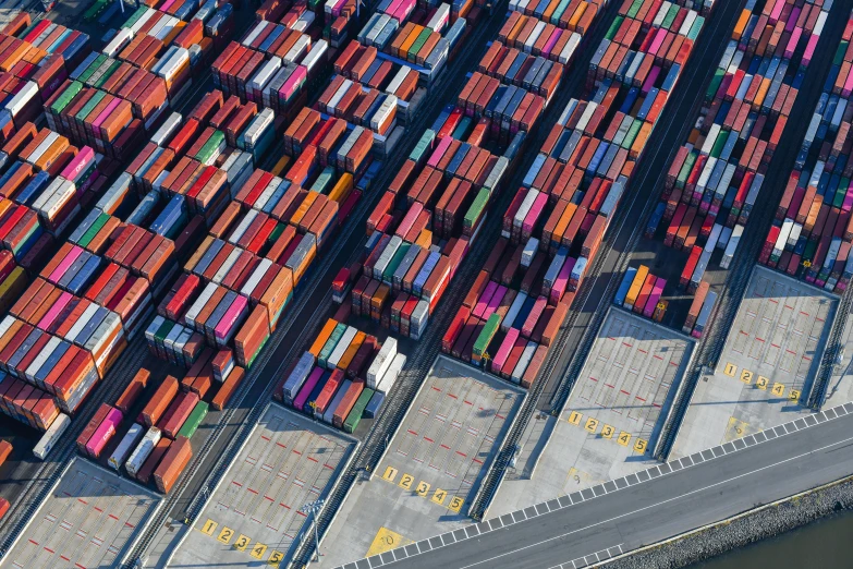 many stacks of containers stacked on top of each other