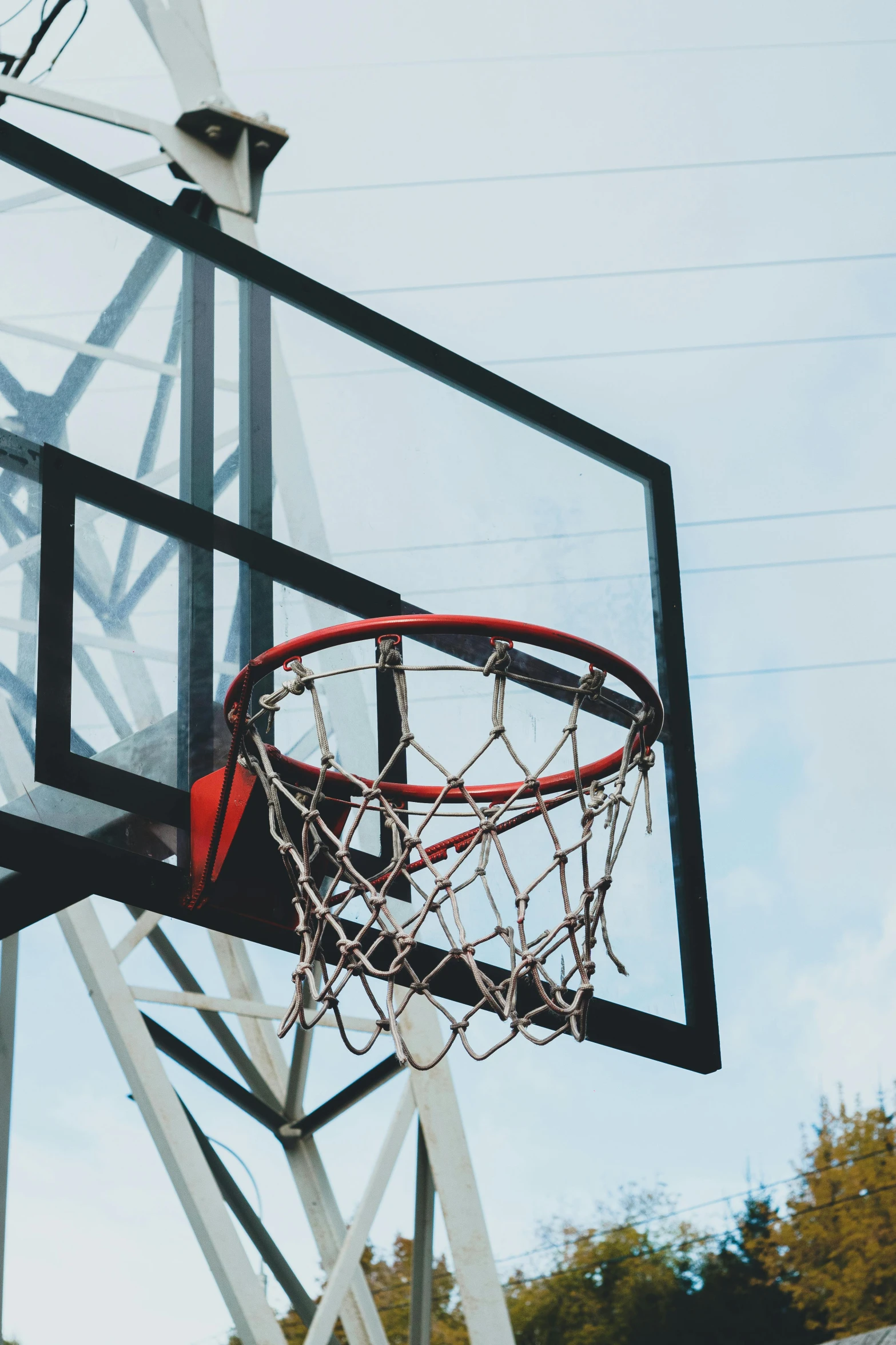 a basketball net with a ball coming out