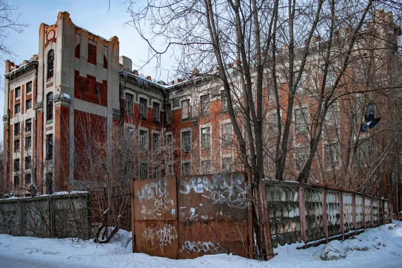 this is an urban setting with a building and trees