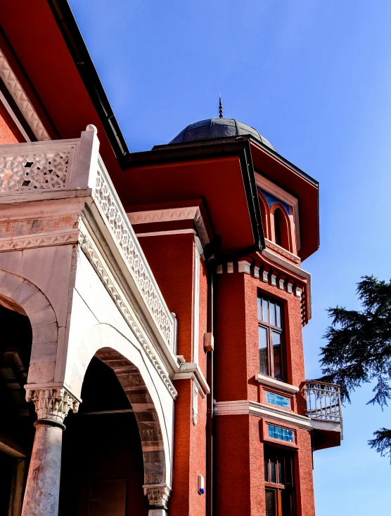 an old building with columns and a clock tower